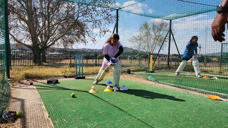 Junior cricket practice in the nets